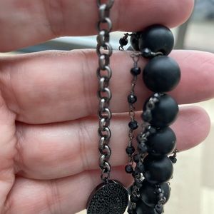 1 stretch bracelet. One clasp bracelet - worn together